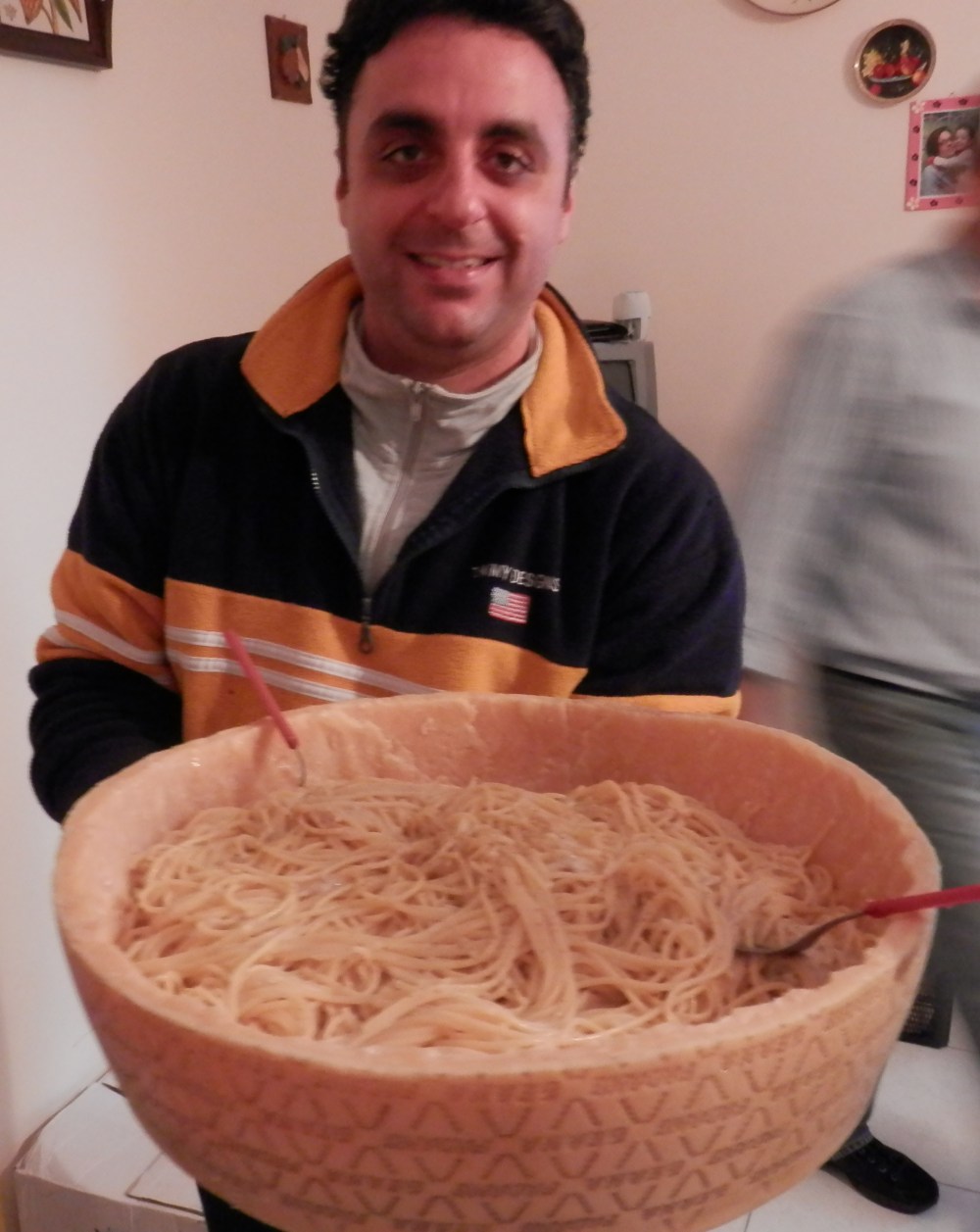 SicilianHousewife - spaghetti in a bowl carved of parmesan cheese
